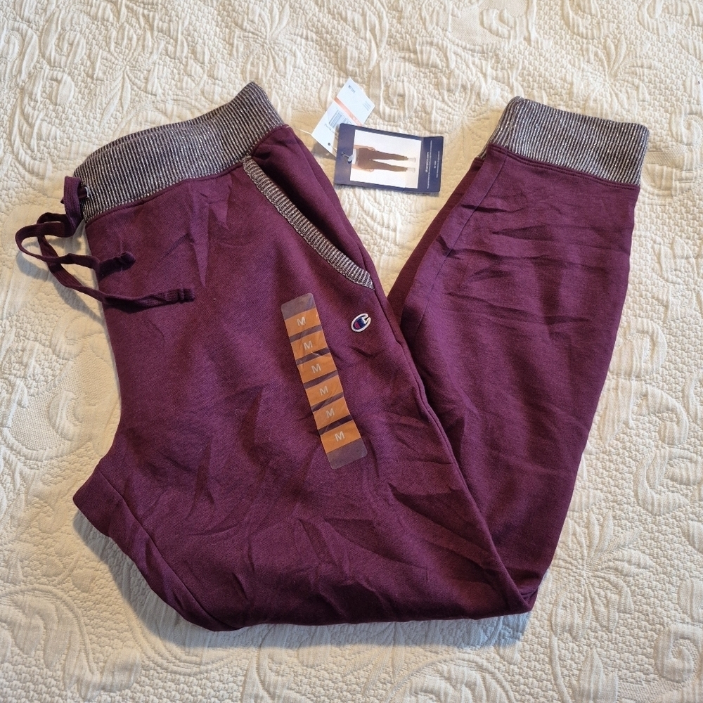 Champion women's size maroon with sparkly silver trim and cuffs joggers NEW